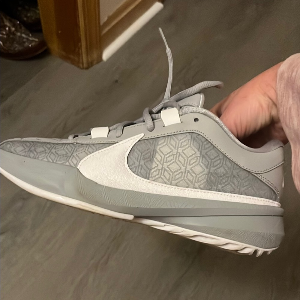 Boys 6.5 Gray and White Nike Shoes